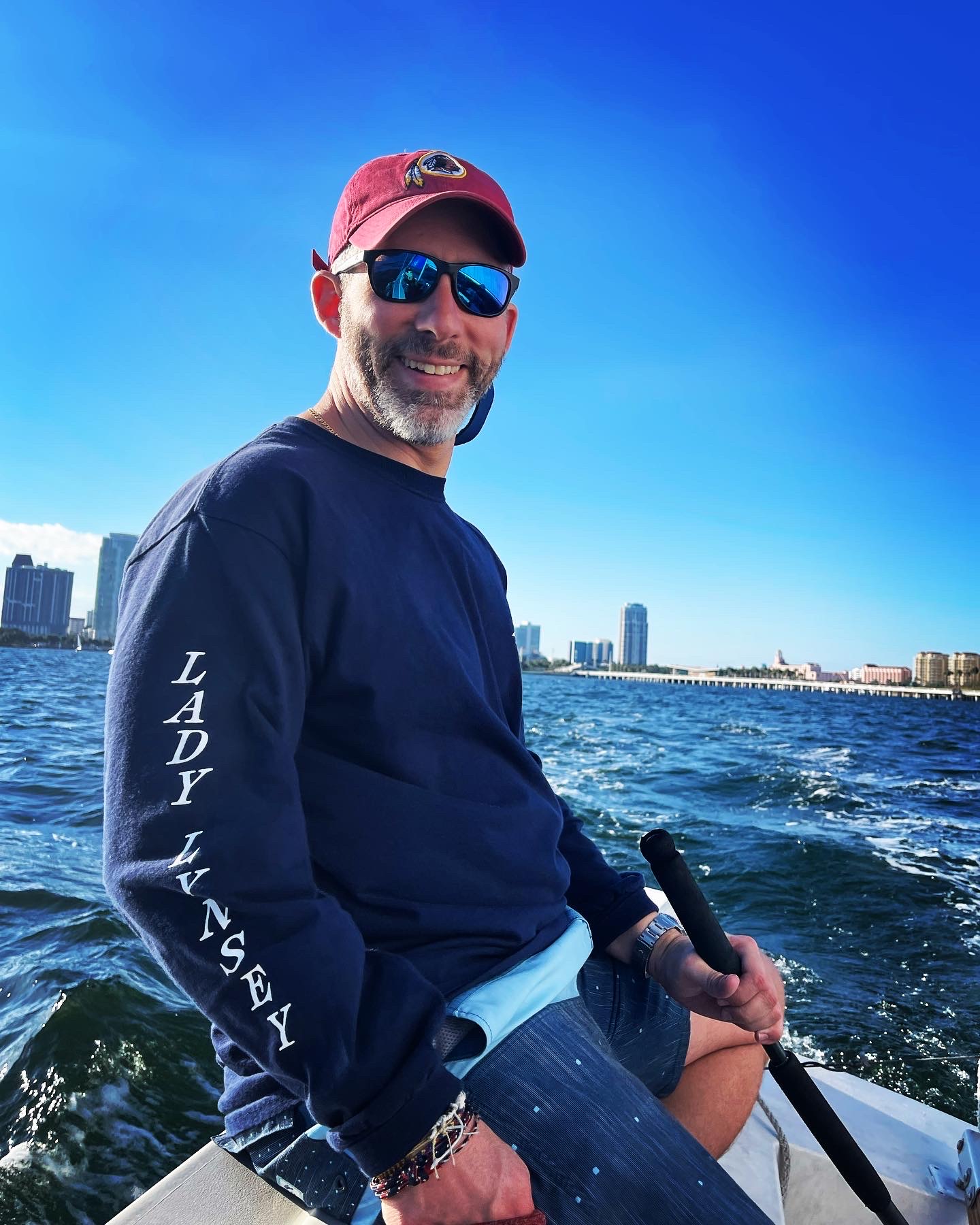 Navistro founder sailing a small boat on Tampa Bay